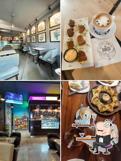 Take a seat at one of the tables at Barista - C Scheme Jaipur