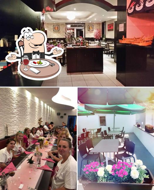 Mira las imágenes que muestran comedor y interior en Restaurant Koi Sushi