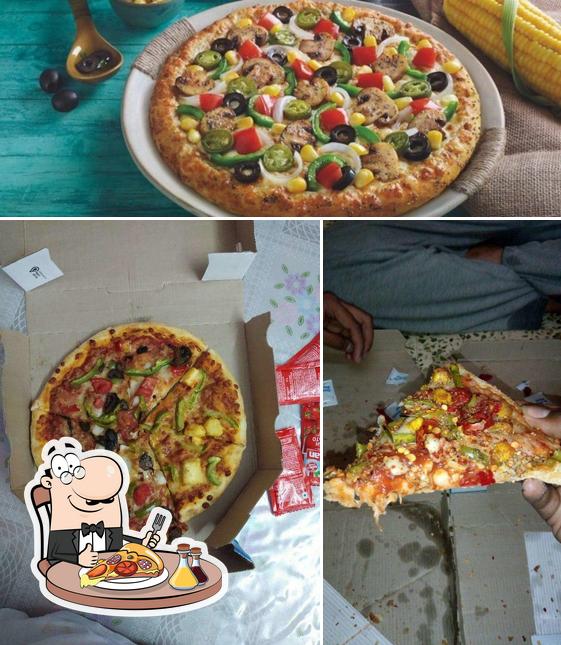 Pick pizza at Domino's Pizza