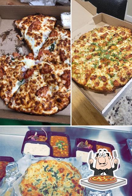 Get pizza at Sanjha Pizza & Curry House