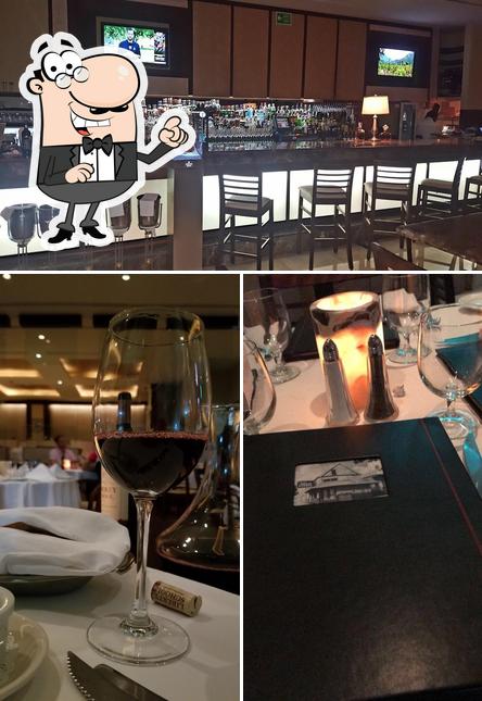 The photo of interior and food at Ruth's Chris Steak House