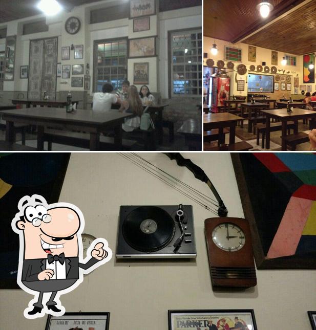 O exterior do Graminha Pizza Por Metro