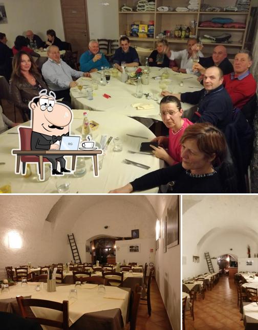 La foto della interni e tavolo da pranzo di La Canva Ristorante Pizzeria