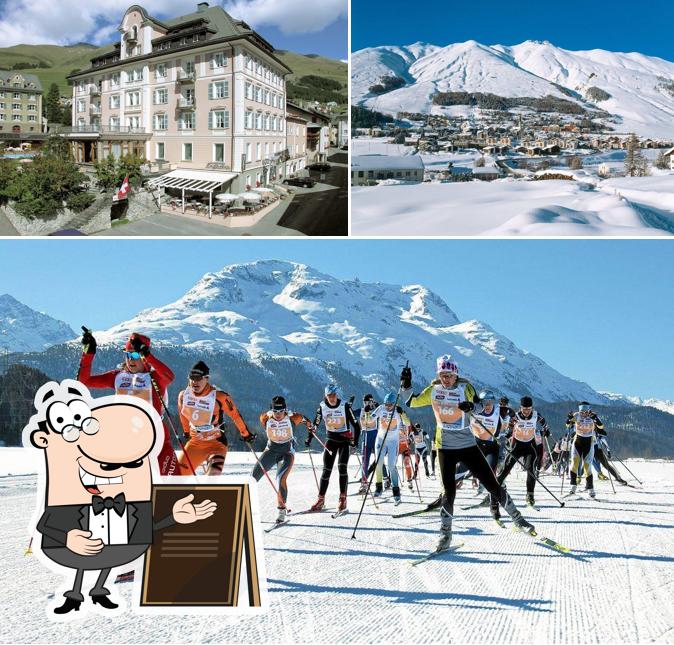 Puoi goderti l'aria fresca da seduto all'esterno di Hotel Engiadina
