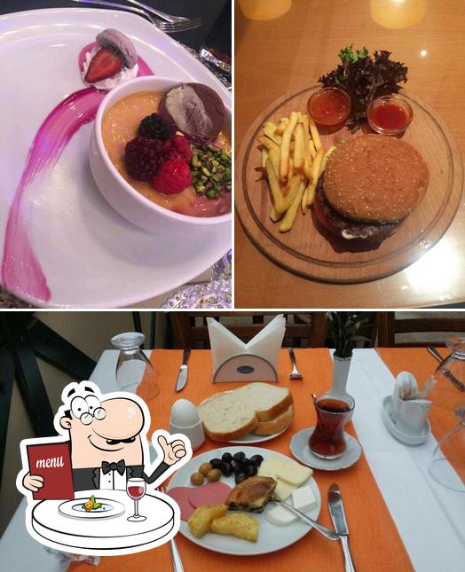 Las imágenes de comida y comedor en C&P Steak House Çelik Palas Hotel