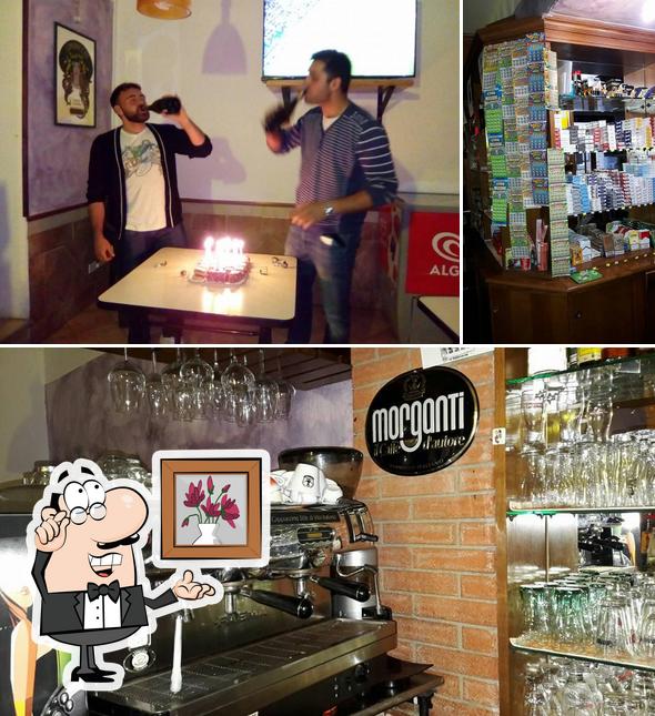 Dai un’occhiata alla foto che mostra la interni e torta di Bar Neno