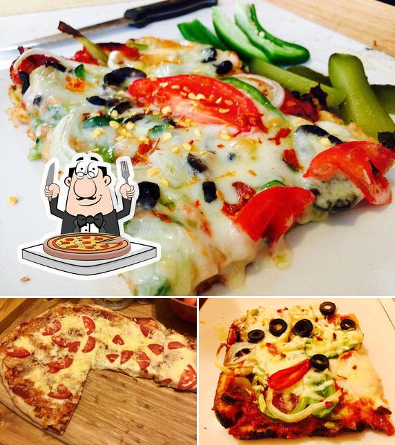 Try out pizza at Vira's BBQ Churrasqueira