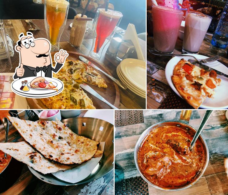 Try out pizza at Sky Deck Lounge