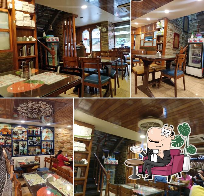 Take a seat at one of the tables at Bagicha Corner