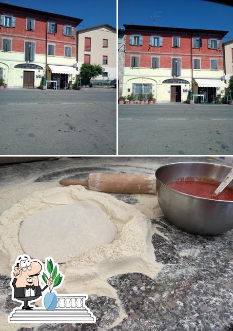 Guarda la foto che presenta la esterno e cibo di Nuovo Mondo Pizza