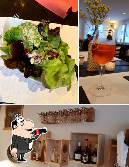 Dai un’occhiata alla immagine che mostra la bevanda e cibo di Gasthaus zum Adler Engi