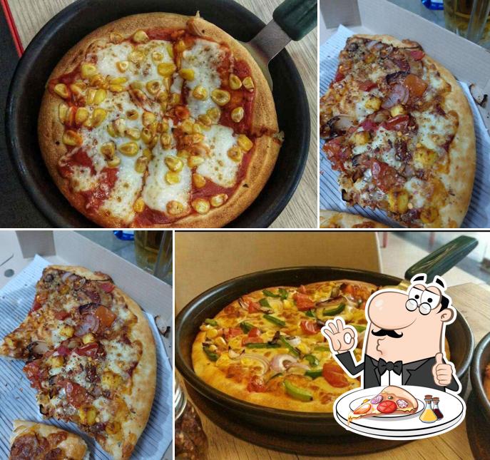 Try out pizza at Pizza Hut Lajpat Nagar, New Delhi