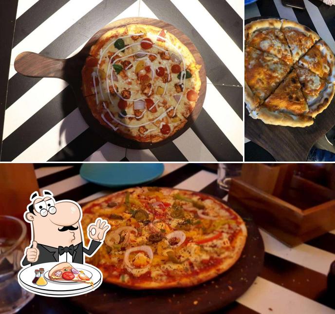Pick pizza at Masala Mastee