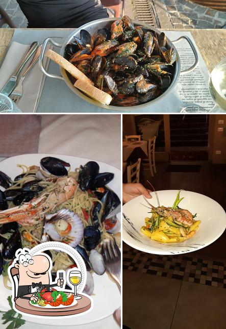 Prenez des fruits de mer à Ristorante Ai Cigni