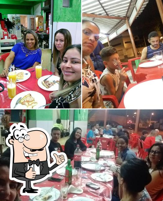 Look at this picture of Porcoes A Pizzaria Da Familia