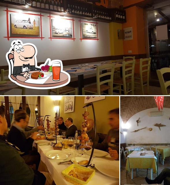 Questa è la foto che raffigura la tavolo da pranzo e interni di Ristorante Pizzeria La Meridiana