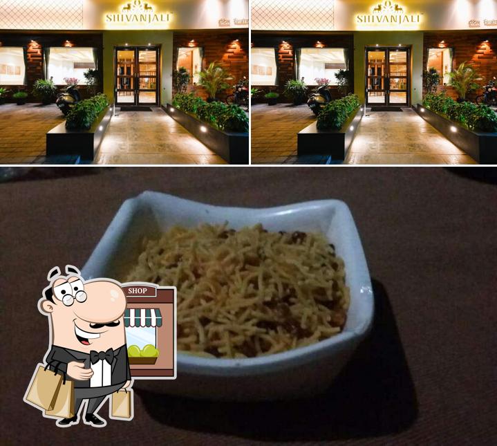 Among various things one can find exterior and food at Hotel Shivanjali & Banquets