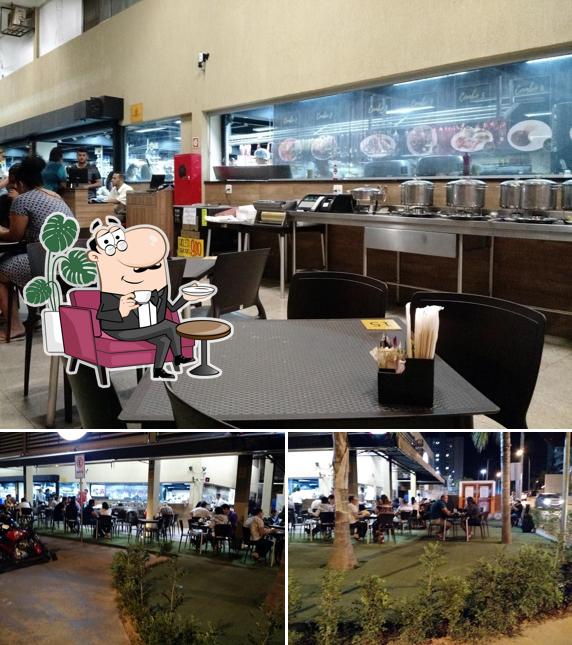 Esta é a imagem apresentando interior e exterior no Pizzaria Bem Melhor