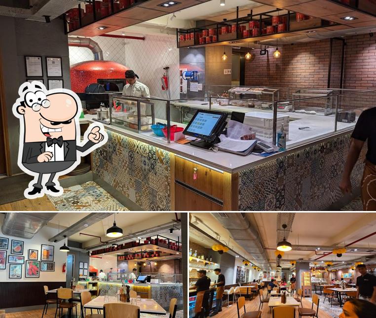 Check out how Si Nonna's - The Original Sourdough Pizza - Fun Republic, Mumbai looks inside