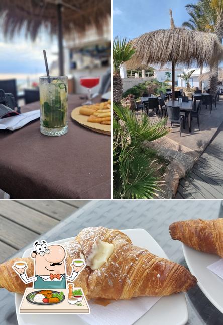 Guarda la foto che presenta la cibo e interni di Ristorante Baia Cornino