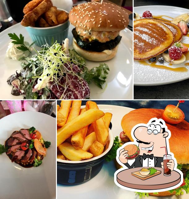 Prenez un hamburger à Einhorn Café • Restaurant • Weinbar