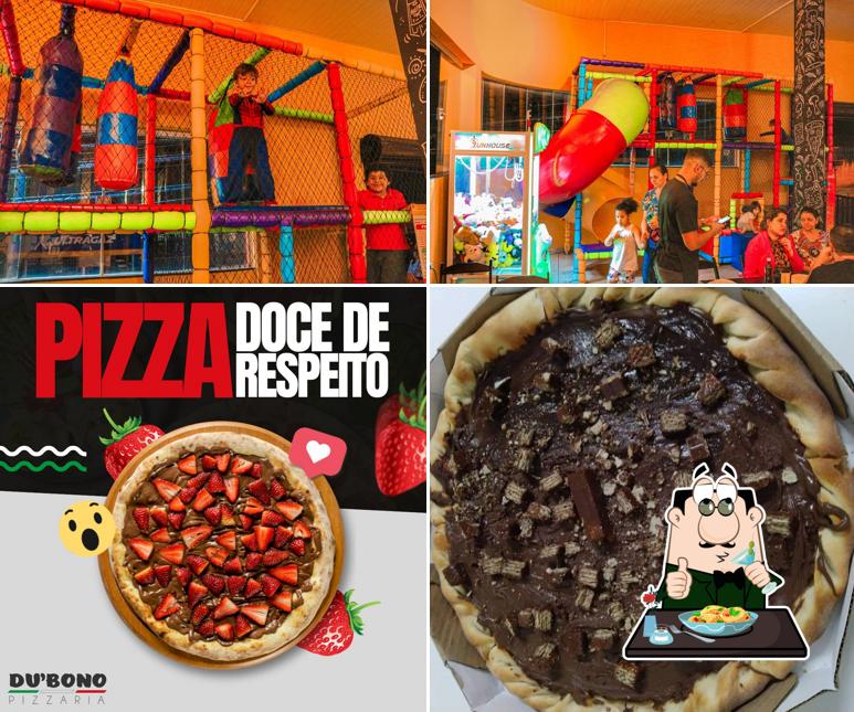 A imagem da comida e área de lazer no Pizzaria Du Bono Alv. Machado