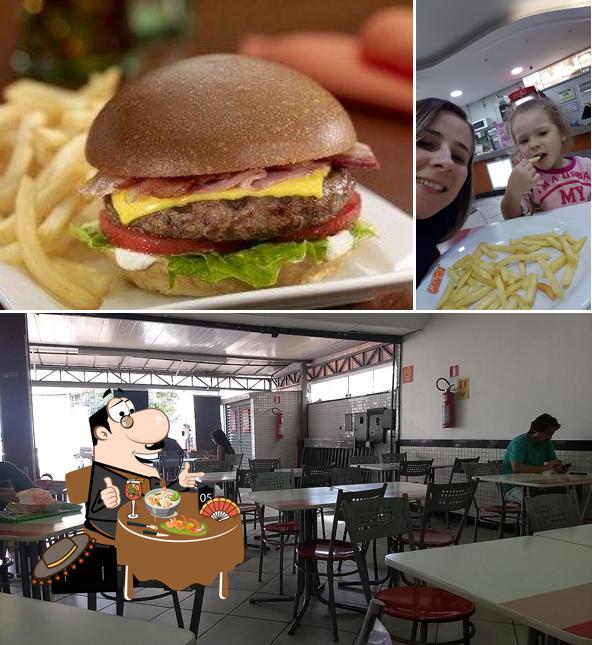 Esta é a ilustração mostrando comida e interior no Giraffas Taguatinga Norte