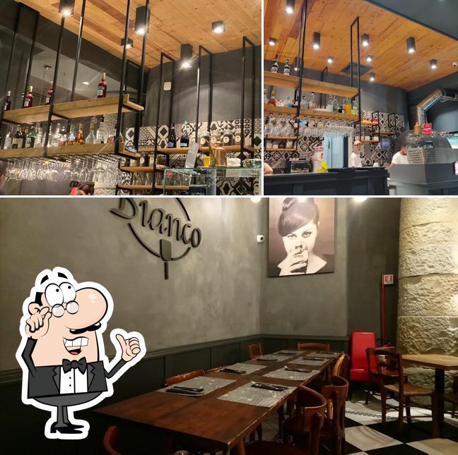 Siediti a un tavolo di Ristorante Pizzeria Bianco