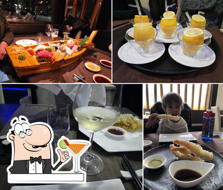 La foto di bevanda e tavolo da pranzo da Yoku sushi fusion experience