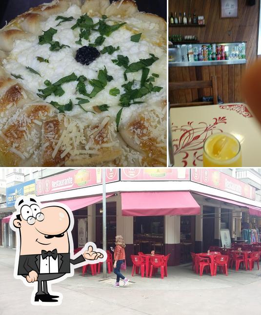 Dê uma olhada a imagem ilustrando interior e comida no Simonetti Lanches