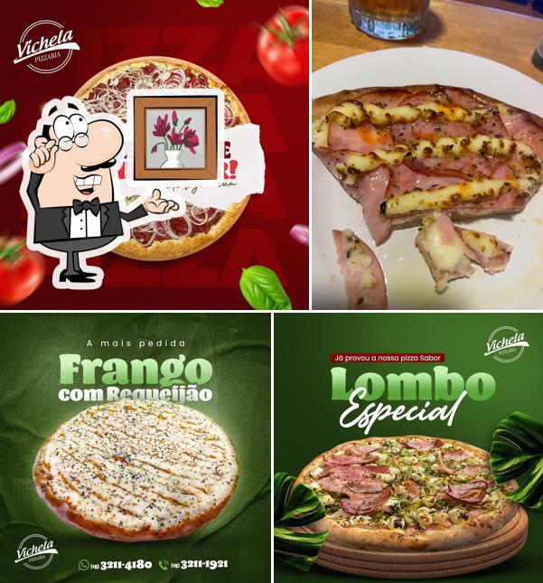 O interior do Vichela Pizzaria