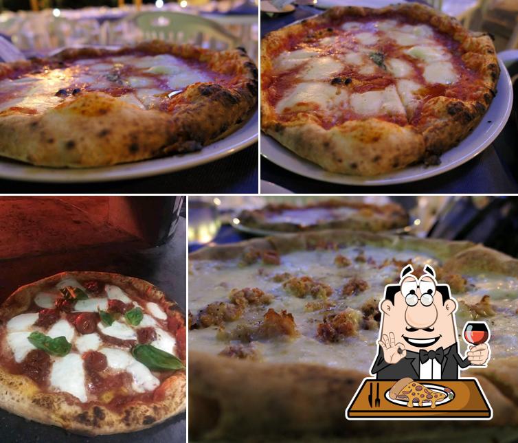 Scegli una pizza a Pizzeria "Antica Arte Napoletana Giardino Esterno