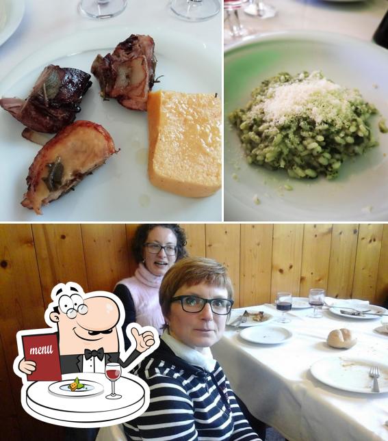 Tra le diverse cose da Trattoria Da Cleto si possono trovare la cibo e interni