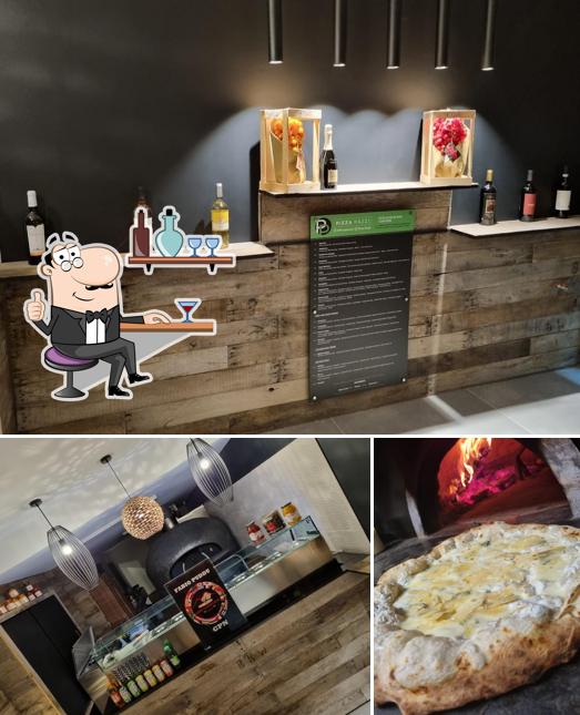 La photo de la intérieur et nourriture de Pizza Pazzi’s