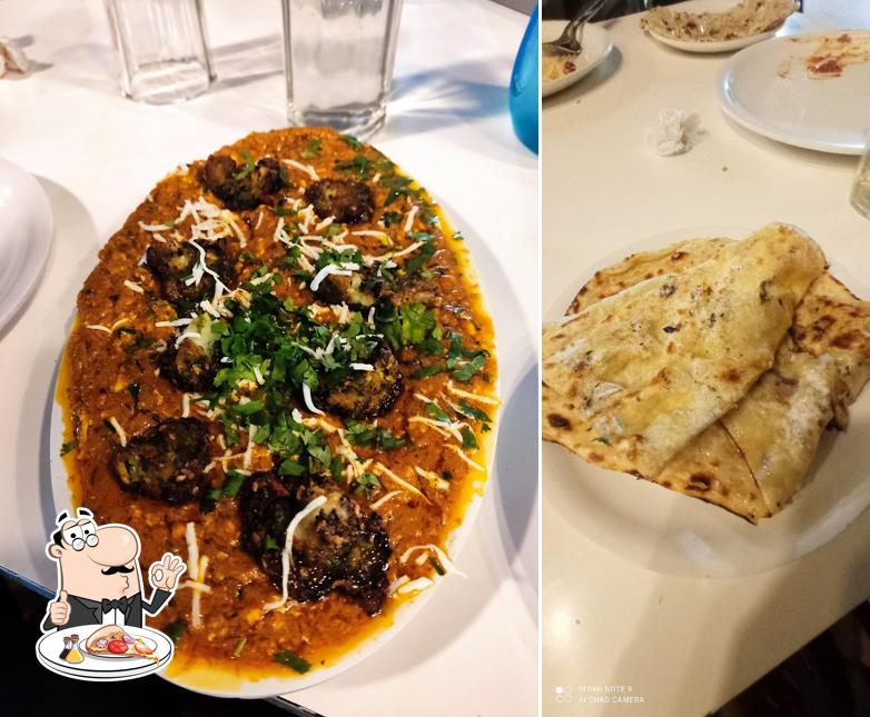 Try out pizza at Hotel Prasadam