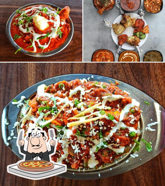 Try out pizza at Dhaba Stories