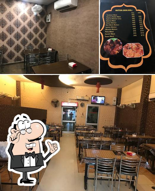 The image of Bawa Chicken’s interior and pizza