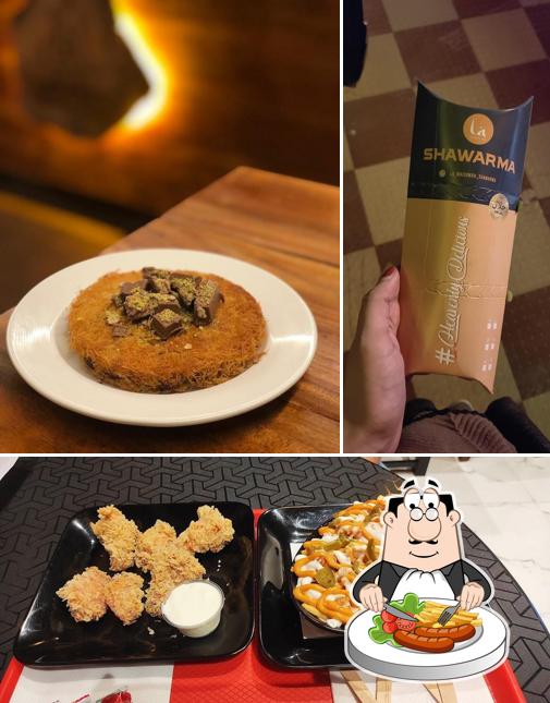Check out the picture displaying food and interior at La Maison Du Kunafa