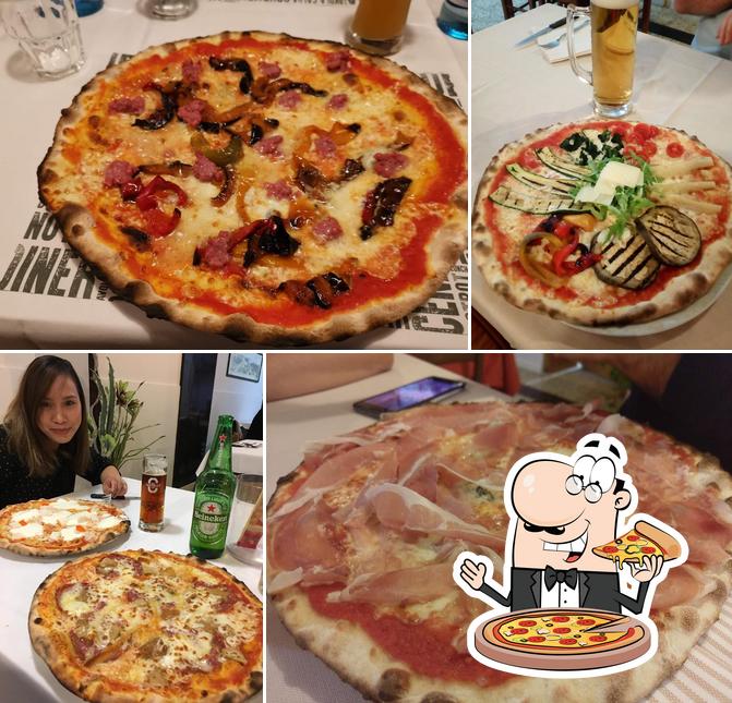 Scegli una pizza a Pizzeria Trattoria Brusada