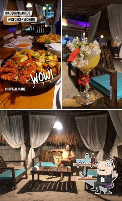 Confira a imagem apresentando interior e comida no Acqua Gastrobar