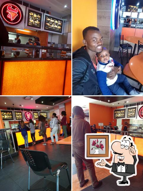 Take a seat at one of the tables at Chicken Licken