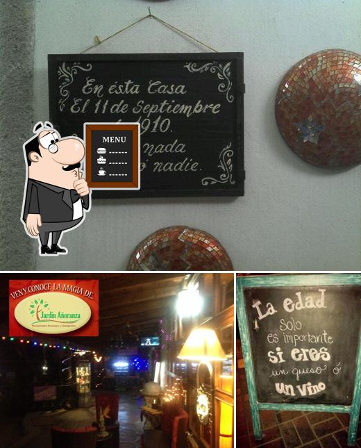 The image of Restaurante La Magia del Jardín Añoranza en Huamantla’s blackboard and bar counter