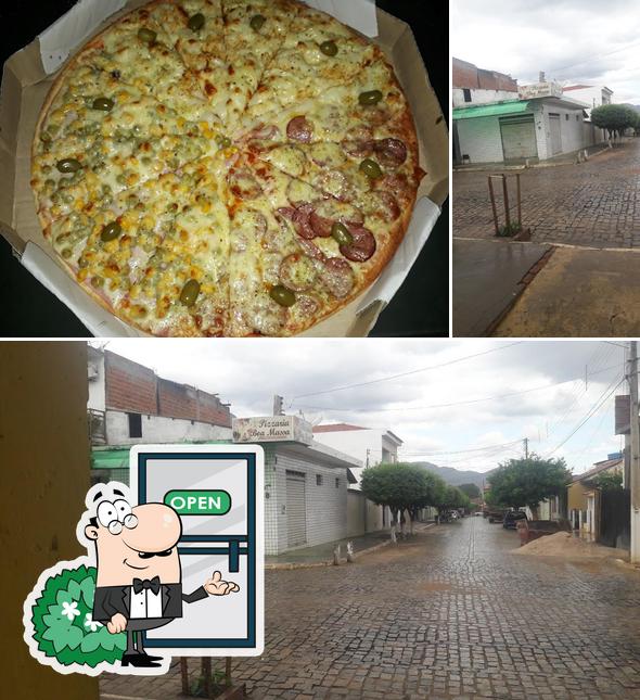 Entre diversos coisas, exterior e pizza podem ser encontrados a Pizzaria Boa Massa