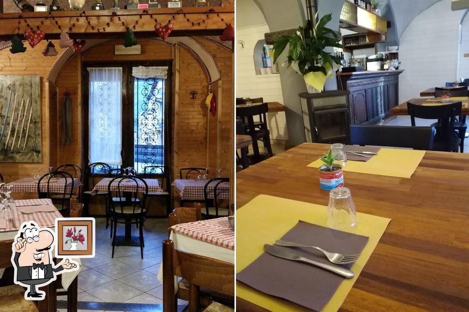 Siediti a un tavolo di Trattoria La Curva