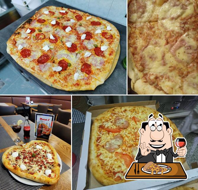 A Pizzeria Modesto, puoi prenderti una bella pizza