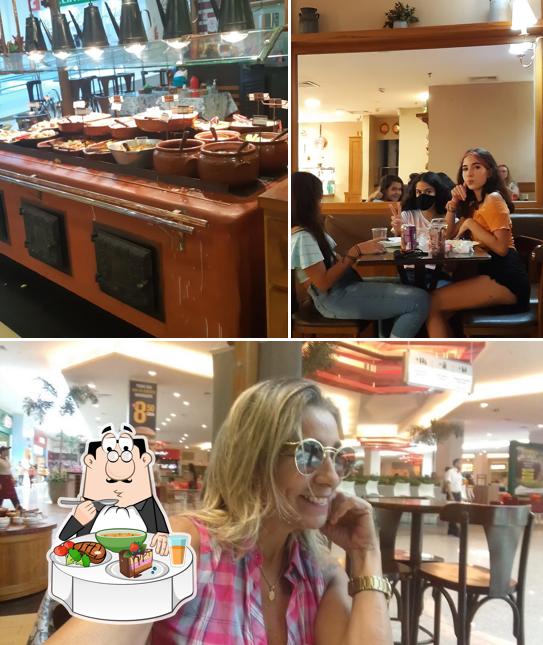 A imagem da mesa de jantar e comida a Divino Fogão - North Shopping Fortaleza