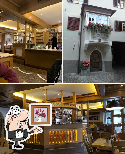 Dai un'occhiata agli interni di Restaurant Pizzeria Hirschen Cervo