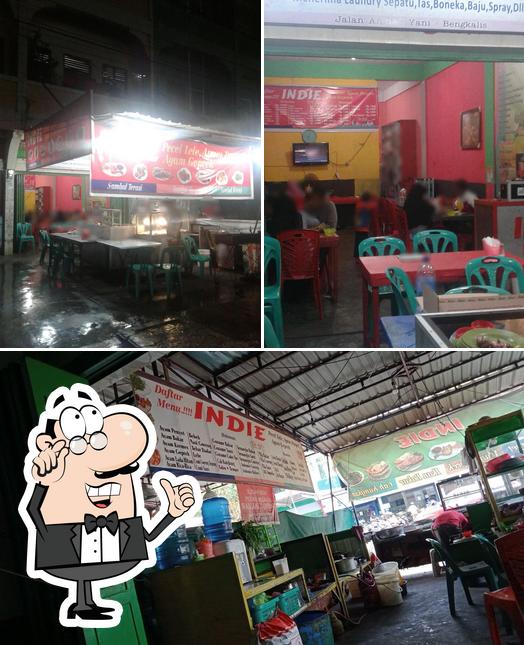 El interior de Indie Pecal Lele/transfortasi onlien travel,ojek 24 jm