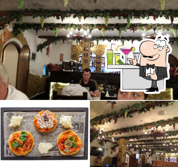 Посмотрите на это фото, где видны барная стойка и еда в Ресторан Молдова