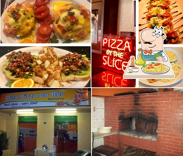 Confira a imagem mostrando comida e interior no Disk Pizza do Rei